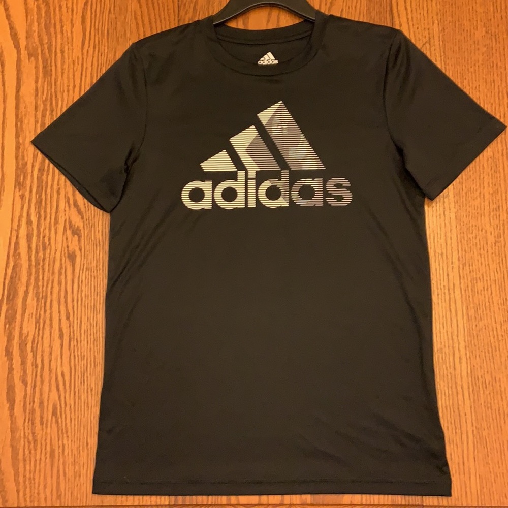 Adidas Boys Athletic Short Sleeve. In excellent condition.